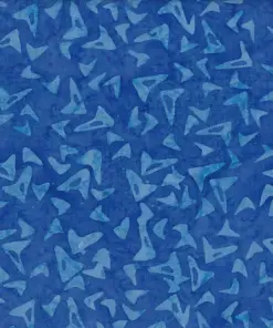 Handmade medium blue cotton batik fabric featuring a geometric boomerang pattern for quilting and sewing.