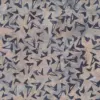 Earthy light yellow and cream handmade cotton boomerang batik fabric, featuring dark gray geometric boomerang motifs.