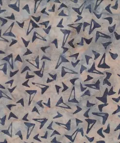 Earthy light yellow and cream handmade cotton boomerang batik fabric, featuring dark gray geometric boomerang motifs.