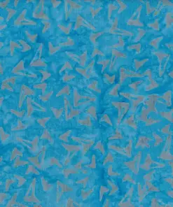Bright sky blue handmade cotton batik fabric adorned with a soft light gray geometric boomerang pattern.