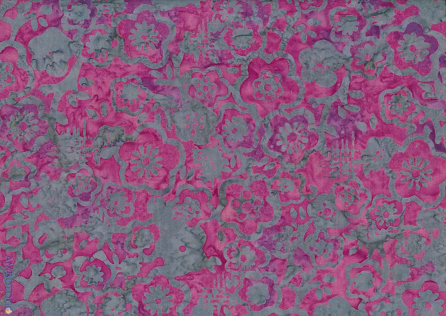 Text: Bold magenta purple Jasmine flowers stamped on a cool gray background in an authentic handmade Indonesian batik fabric.