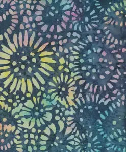 Dark slate gray batik fabric with pastel multicolor sunflower stamps