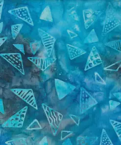 Authentic ocean blue geometric batik fabric featuring hand-stamped triangle motifs, ideal for quilting and apparel.