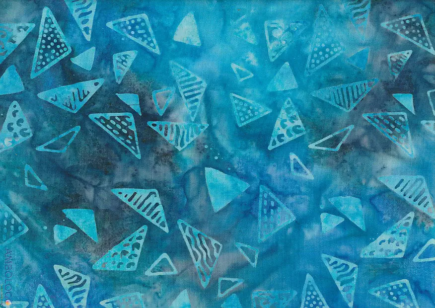 Authentic ocean blue geometric batik fabric featuring hand-stamped triangle motifs, ideal for quilting and apparel.