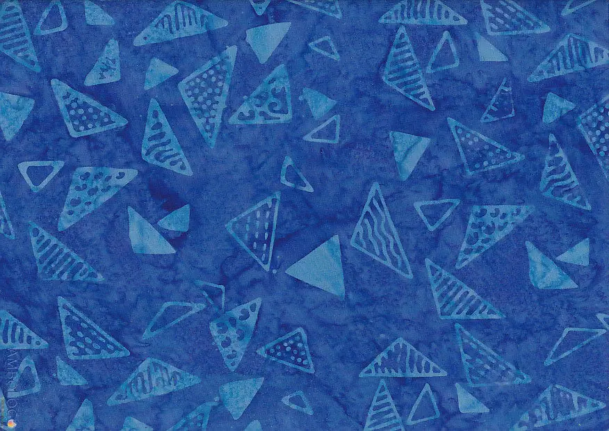Deep ocean blue monochromatic geometric batik fabric with light blue triangle stamps for coastal crafts.