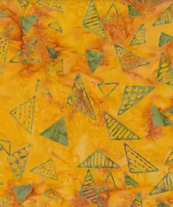 Vibrant orange geometric batik fabric with olive green triangle stamps for fall quilting.