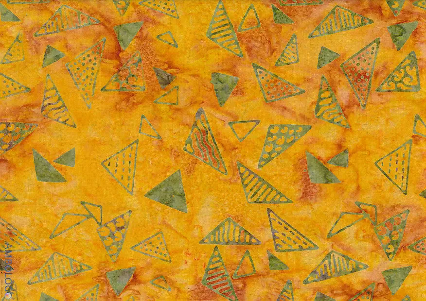 Vibrant orange geometric batik fabric with olive green triangle stamps for fall quilting.