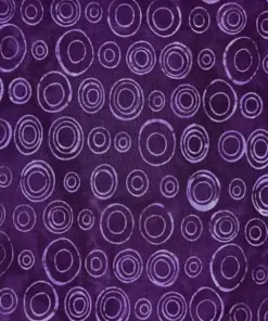 Dark purple circle batik fabric wholesale showing deep plum tones and handmade ring patterns for elegant quilting and fashion.
