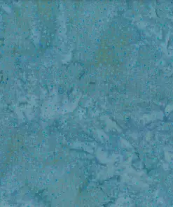 Serene cadet blue dotted batik fabric showcasing a soft, dusty blue background with delicate, darker blue speckles on 100% premium cotton, ideal for calming crafts.
