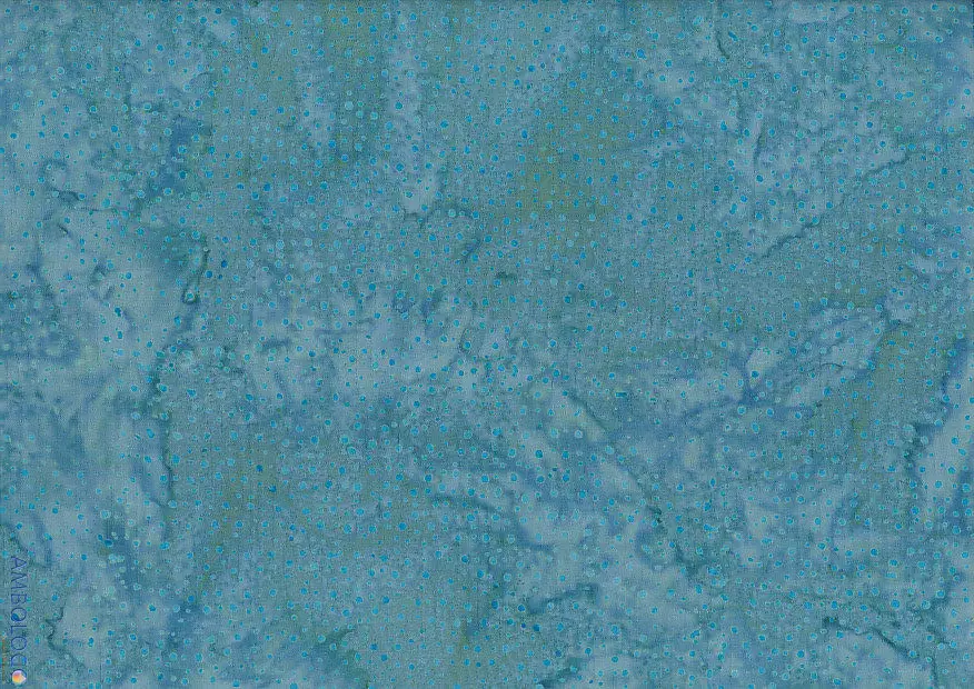 Serene cadet blue dotted batik fabric showcasing a soft, dusty blue background with delicate, darker blue speckles on 100% premium cotton, ideal for calming crafts.
