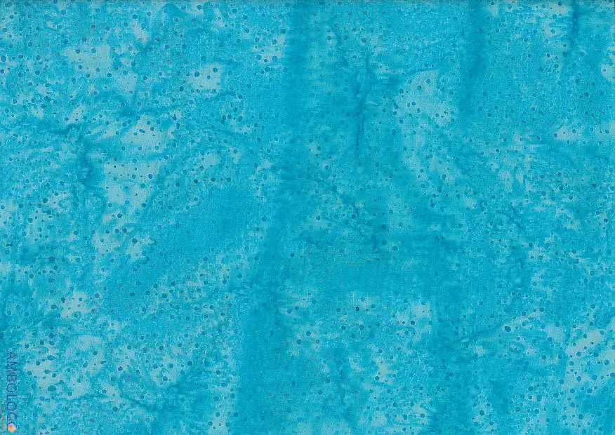 Rich dark cyan dotted batik fabric displaying deep teal marbling and vibrant speckled textures on 100% premium cotton, ideal for elegant textile crafts.