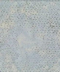 Soft light gray dotted batik fabric with delicate silver-blue undertones and dark speckled textures on 100% premium cotton, an excellent neutral blender