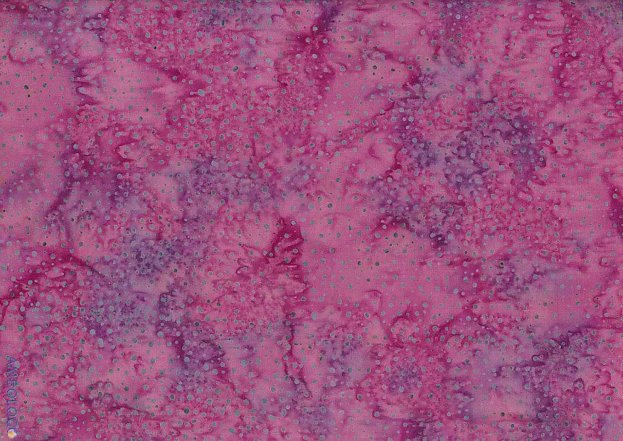 Detailed view of vibrant pink dotted batik fabric with cool blue and purple speckles on 100% premium cotton, handcrafted in Indonesia for stunning textile arts.