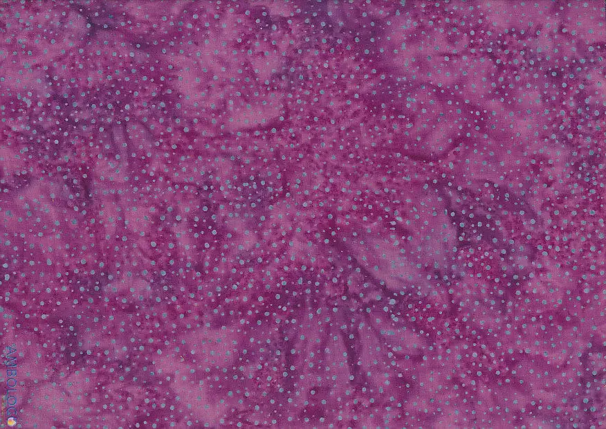 Warm purple dotted batik fabric showcasing rich berry and magenta tones with contrasting light blue speckles on 100% premium cotton, handcrafted in Indonesia.