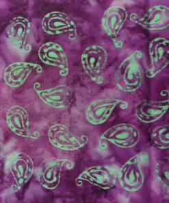 Vibrant green and purple hand-dyed authentic paisley batik fabric for quilting and sewing, made in Pekalongan Indonesia.