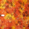 Small-scale tropical palm frond pattern on sunset orange and warm yellow hand-dyed tropical palm leaf batik fabric with 100%cotton.