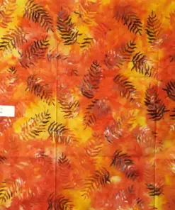 Small-scale tropical palm frond pattern on sunset orange and warm yellow hand-dyed tropical palm leaf batik fabric with 100%cotton.