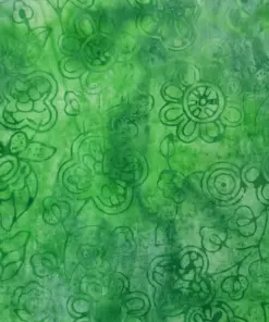 Emerald fern green hand-stamped Indonesian wild aster floral batik fabric for woodland crafts.