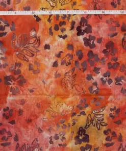Autumn Bloom hand-stamped Marigold batik quilting fabric in sunset rust, orange, and amber with floral motifs, handmade in Pekalongan Indonesia.