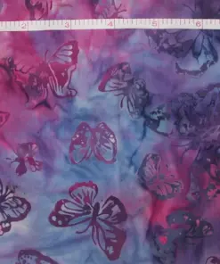 Hand-dyed blue and purple butterfly tropical batik fabric made from premium quilting cotton.