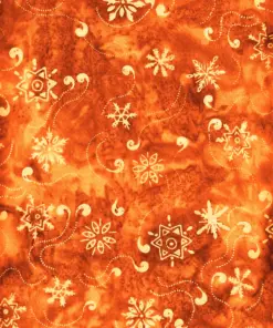 Burnt orange snowflake and star Bali batik fabric, 100% cotton hand-dyed Christmas quilting material by the yard.