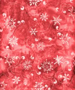 Classic holiday red snowflake Bali batik fabric, authentic hand-stamped Christmas cotton for quilting and crafts.