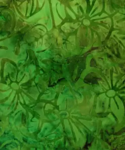 100% cotton Rich Emerald Hosta green botanical Clematis Floral Batik Quilting Fabric. displaying traditional hand-stamped leaf and floral designs.
