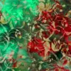 Emerald green and crimson red botanical Wild Ivy Batik Quilting Fabric by the yard for holiday