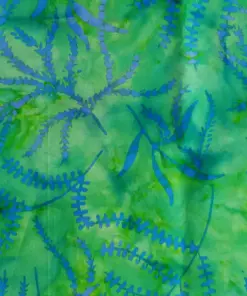 Tropical lush Fern Green Blue batik quilting fabric by the yard featuring hand-dyed floral prints on a vibrant green cotton background.