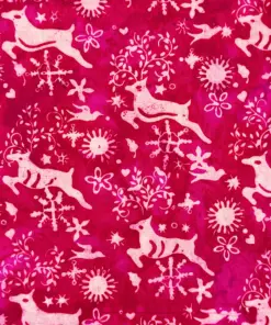 Vibrant hot pink deer batik fabric with festive Christmas snowflake patterns and reindeer for modern holiday sewing.