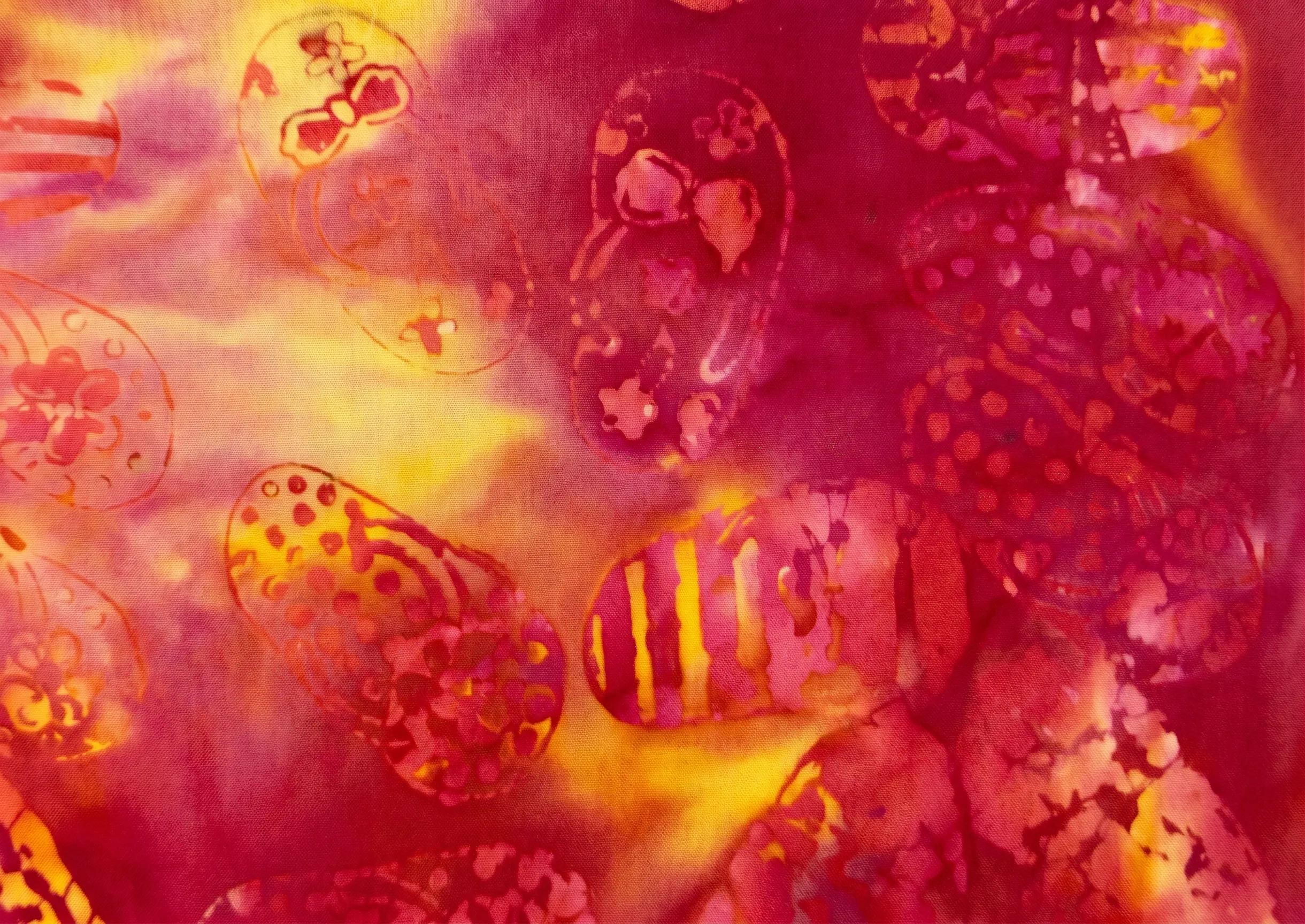 Warm sunset pink and yellow tie-dye sandal print 100% cotton batik fabric for quilting.