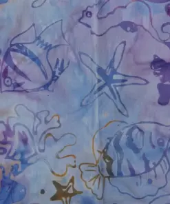 Pastel purple and blue coastal themed batik fabric displaying delicate hand-drawn style fish, coral, and shells.