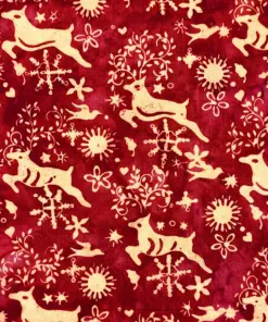 Classic red Christmas deer batik fabric with traditional reindeer, snowflakes, and festive holiday elements.