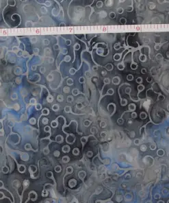 Slate gray and charcoal blue hand-dyed batik fabric with an abstract deep ocean coral and bubble pattern.