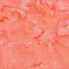 Close-up texture of Sweet Georgia peach tie-dye batik fabric showing mottled coral pink, warm salmon, and golden-yellow watercolor veins on 100% combed cotton.