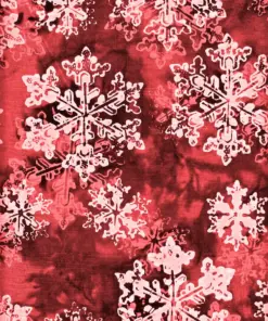 Deep red and white snowflake Bali batik quilting fabric showcasing rich traditional Indonesian dye patterns.