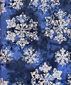 Navy blue snowflake pattern on authentic Bali batik apparel fabric, handcrafted in Pekalongan for winter projects.