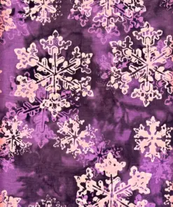 Rich purple and white snowflake Bali batik fabric showcasing traditional Indonesian dye craftsmanship for quilting.