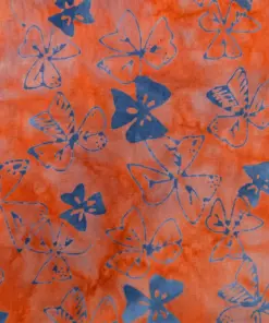 Southwestern style sedona rust and slate blue dogwood batik fabric with organic moss textures for rustic home decor sewing.