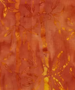 Intense burnt orange and copper batik fabric with contrasting deep indigo hues and golden bamboo prints.