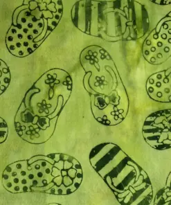 Bright lime green hand-stamped sandal motif 100% cotton batik quilting fabric. Title: Bright Lime Green Sandal Motif Batik Cotton Fabric