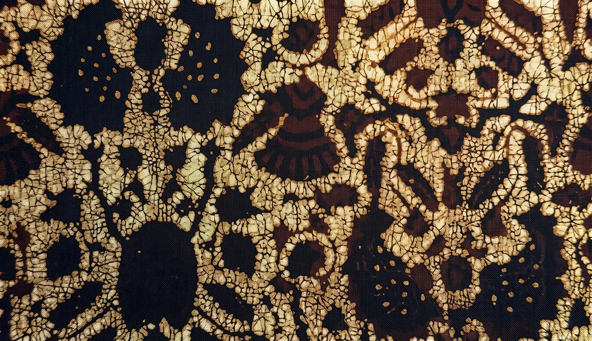 Authentic Bledak Sidoluhur batik motif with traditional cakar ayam pattern and hand-dyed black background